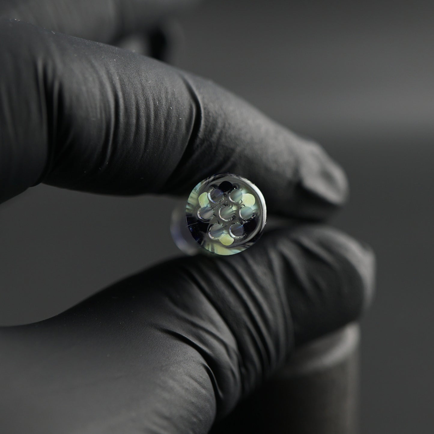 Detail view of the 7-hole design in the Lunar Echo collector glass tip