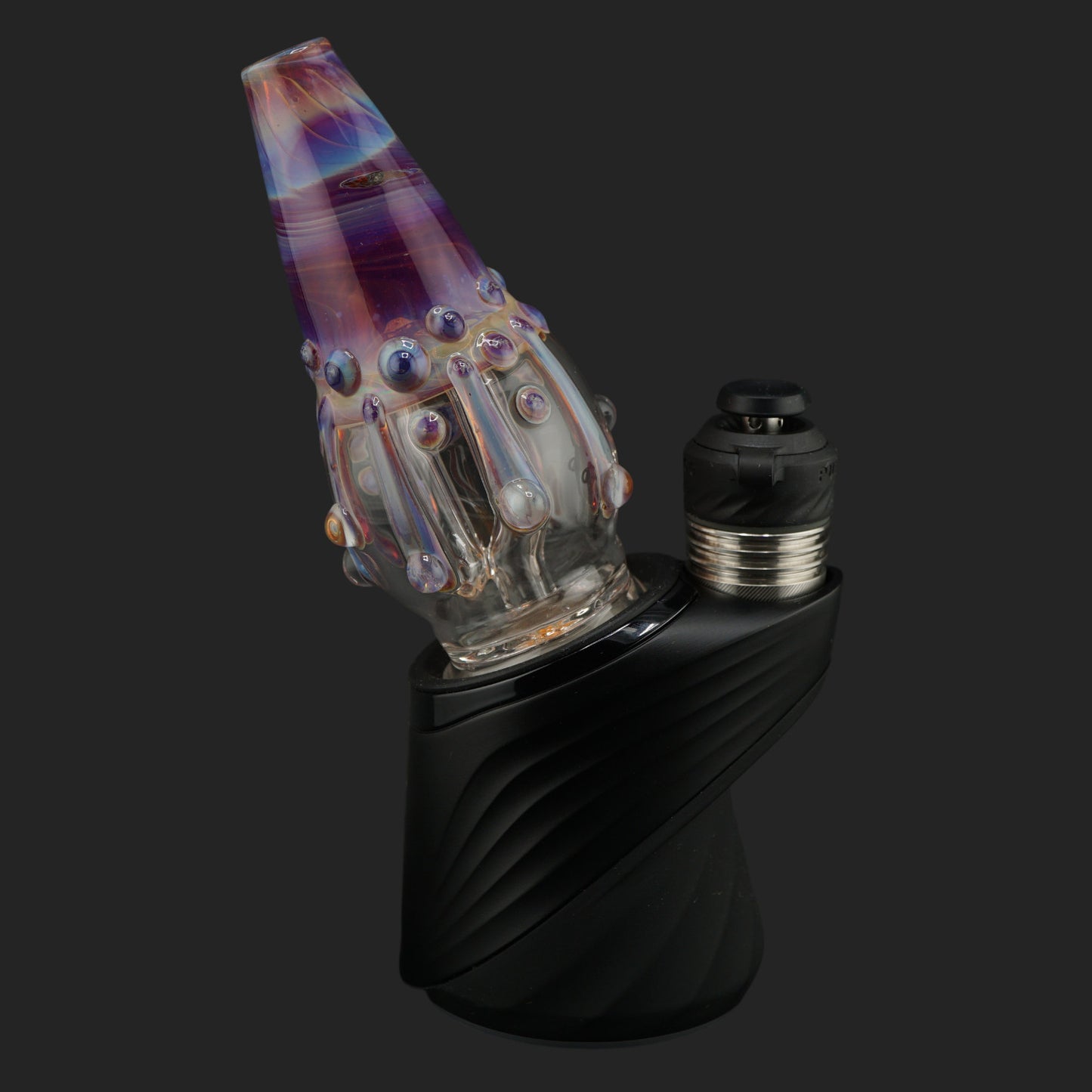 Right angle view of the Jelly Veil Puffco Peak Pro wet top showcasing layered glass tentacles and color shifting glass.