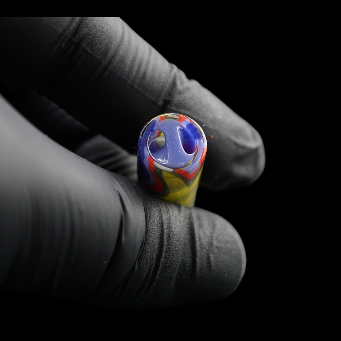Close-up of the purple spiral Rotini filter inside the Tyeglassarts Lime Tempest glass tip
