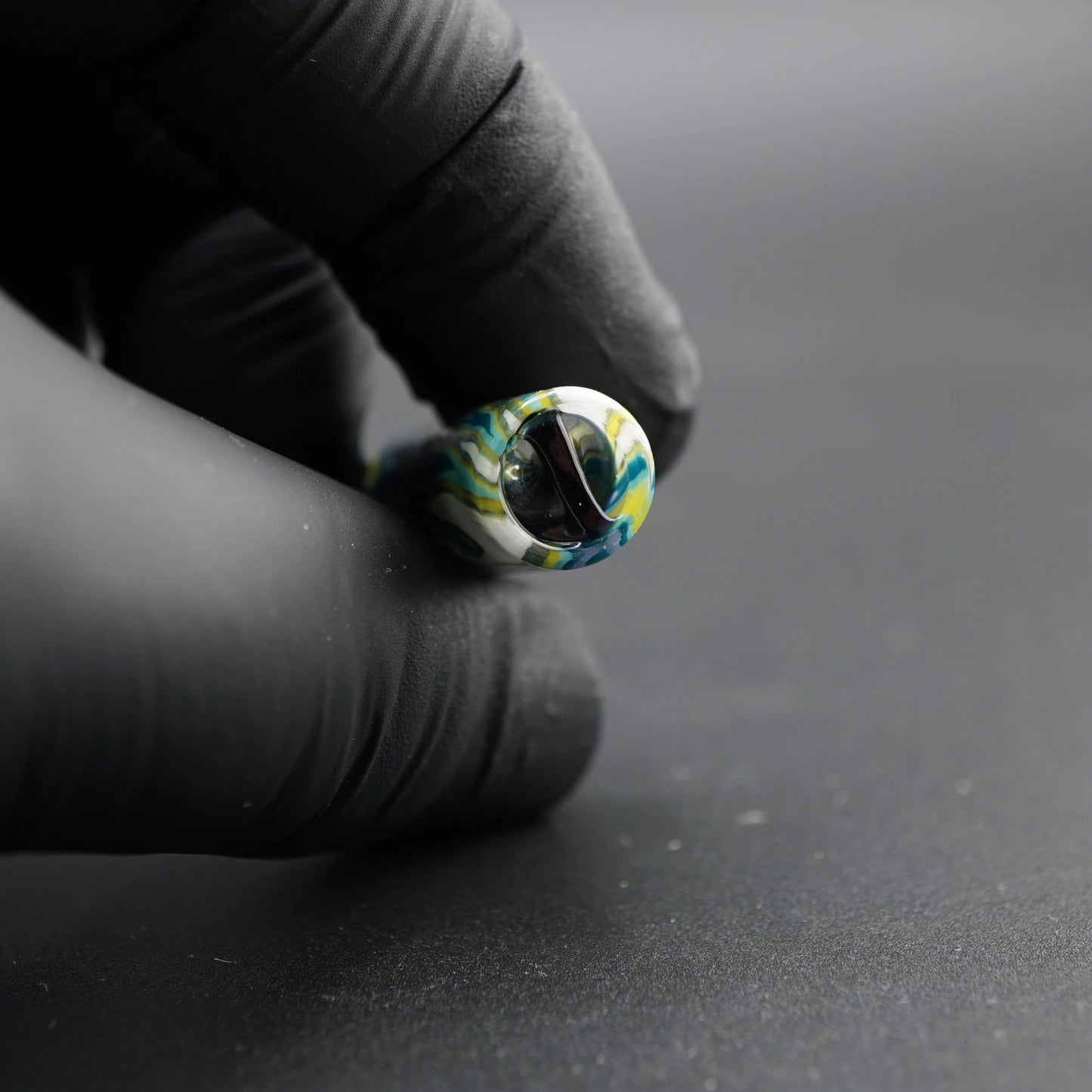Close-up of the black spiral Rotini filter inside the Tyeglassarts Polar Lagoon glass tip