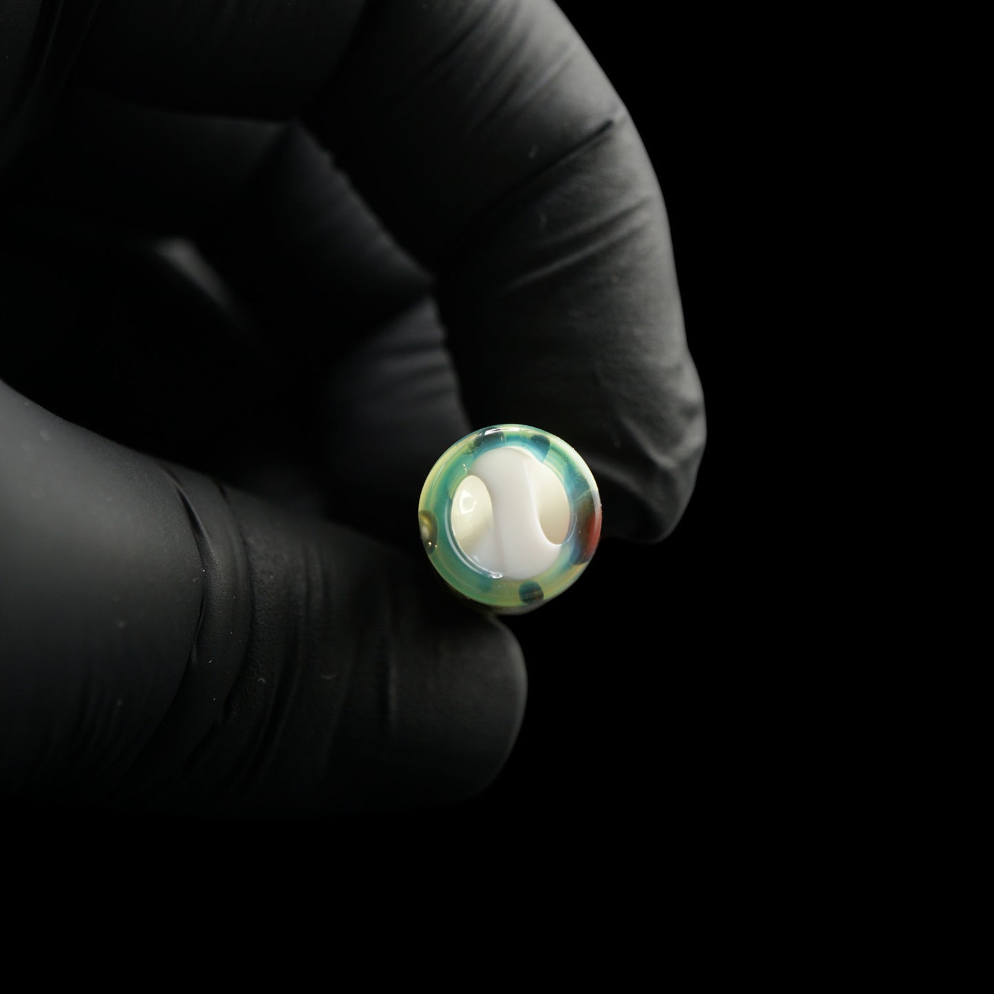 Close-up of the spiral Rotini glass filter inside the handmade Tyeglassarts Relic joint tip