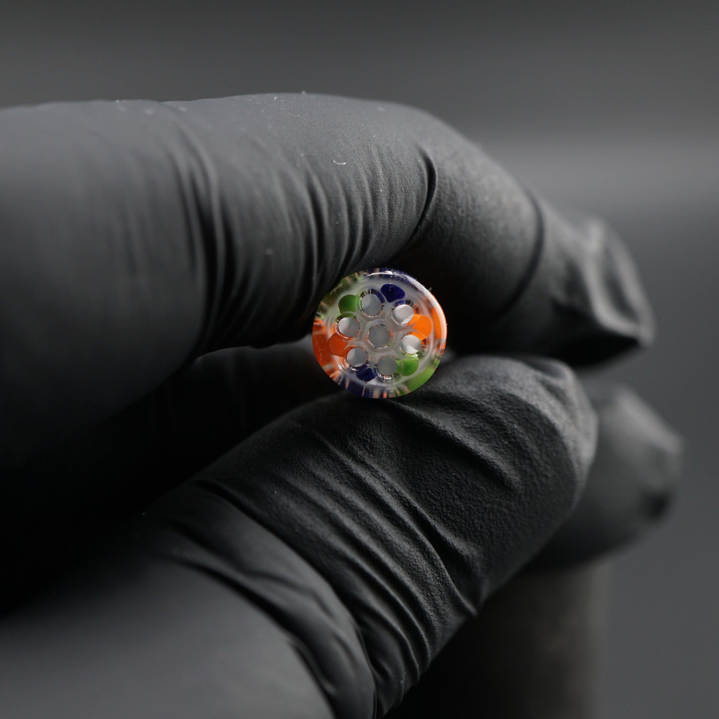 Detail view of the 7-hole design in the Coral Tide collector glass tip