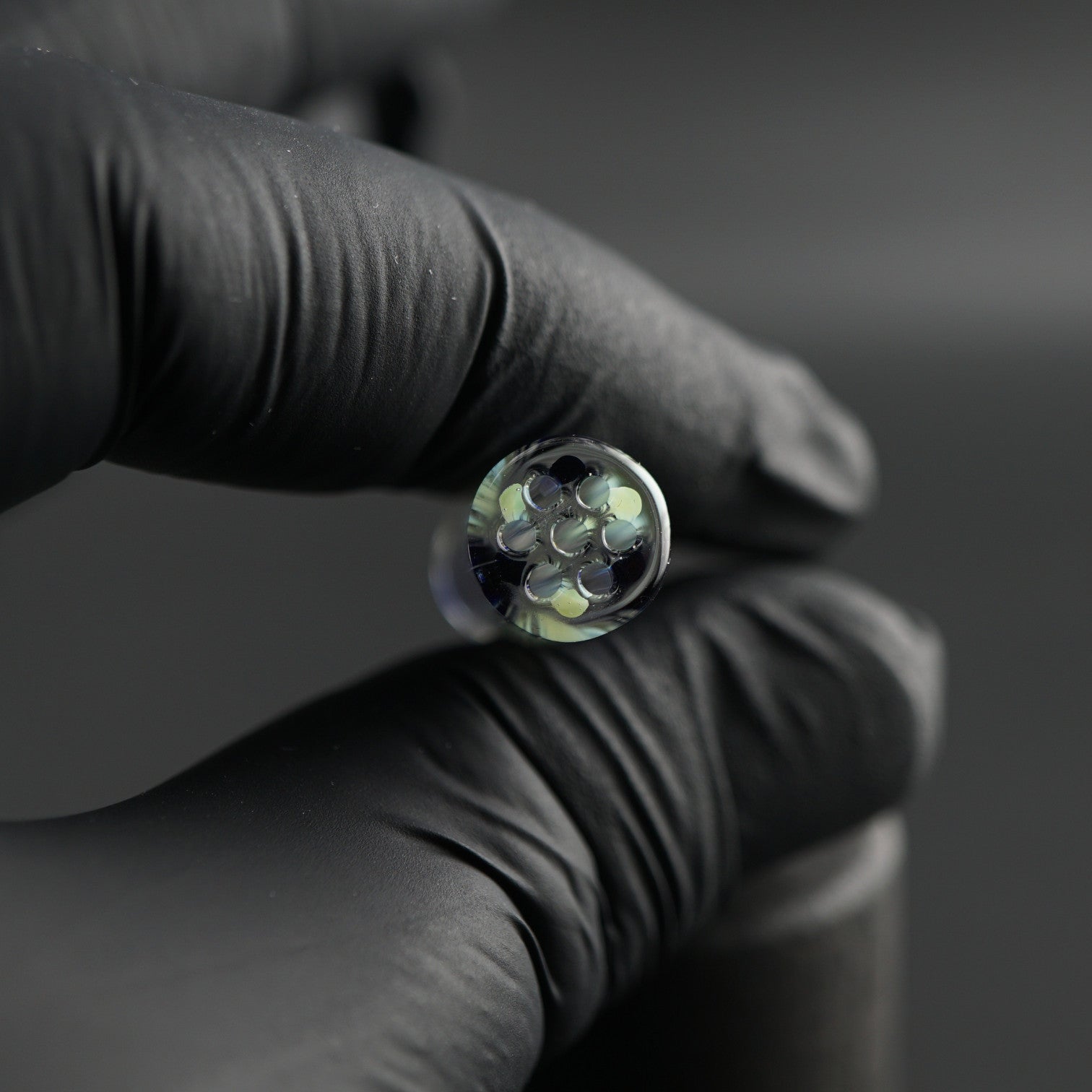 Detail view of the 7-hole design in the Lunar Echo collector glass tip