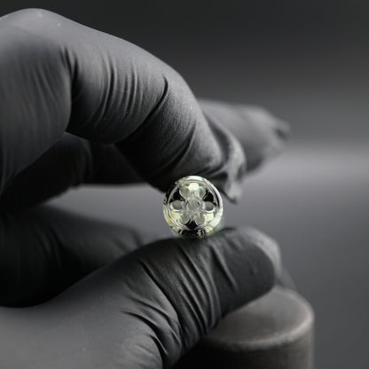 Close-up of the black sparkle core inside the Obsidian Ghost collector glass tip by Blazing Blue Glass