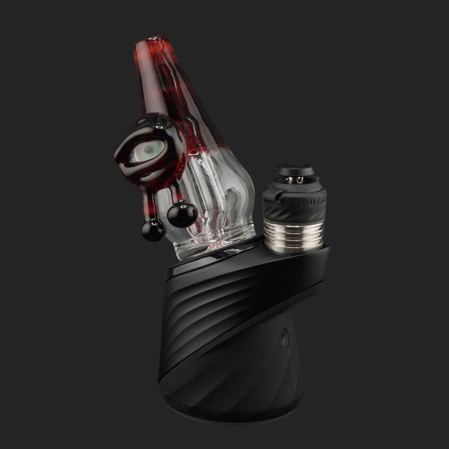 Side profile of the Crimson Watch wet top with a deep ruby red mouthpiece mounted on a Puffco Peak Pro.