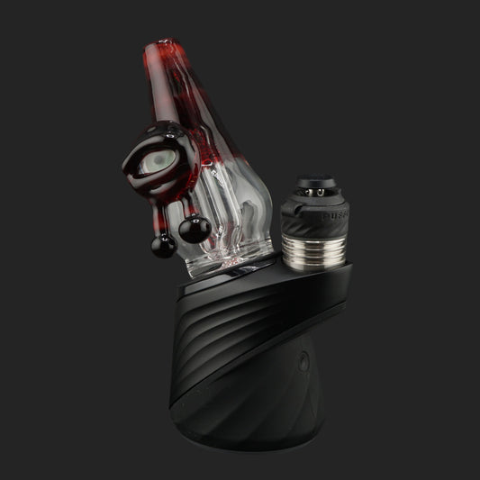 Side profile of the Crimson Watch wet top with a deep ruby red mouthpiece mounted on a Puffco Peak Pro.