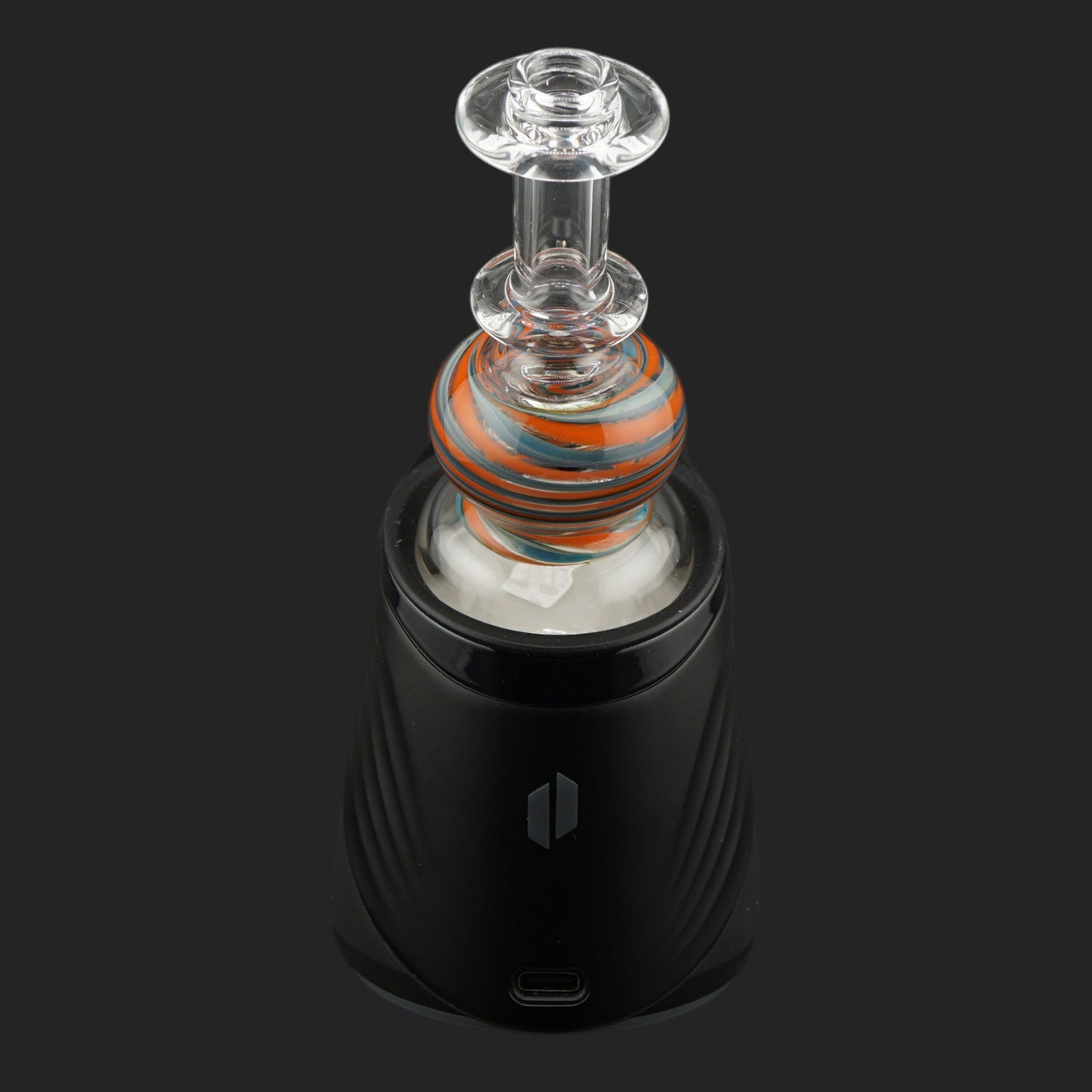 Side view of the Ember Orbit dry top with a transparent mouthpiece and orange striped glass sphere.