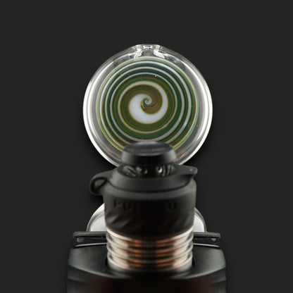 Close-up of the Forest Eye spiral showcasing green, blue and earthy tones with subtle sparkling accents.