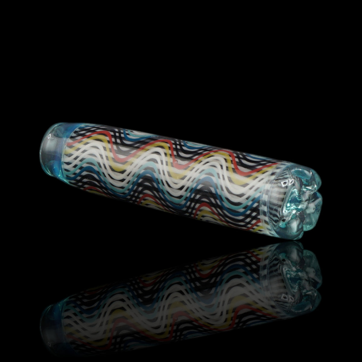 Angled view of the Leisure Glass Aqua Current glass tip showing its Hypnotech wave pattern and transparent aqua blue filter end