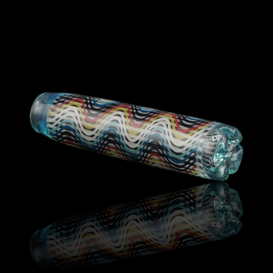 Angled view of the Leisure Glass Aqua Current glass tip showing its Hypnotech wave pattern and transparent aqua blue filter end