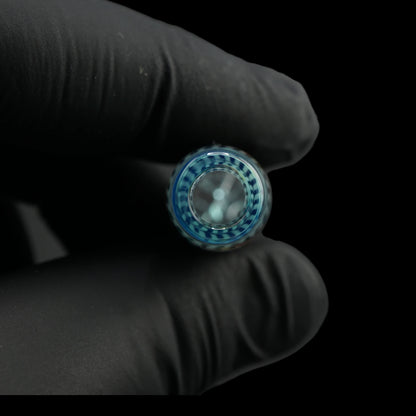 Close-up of the round mouthpiece opening on the Leisure Glass Aqua Current glass tip with transparent aqua blue glass