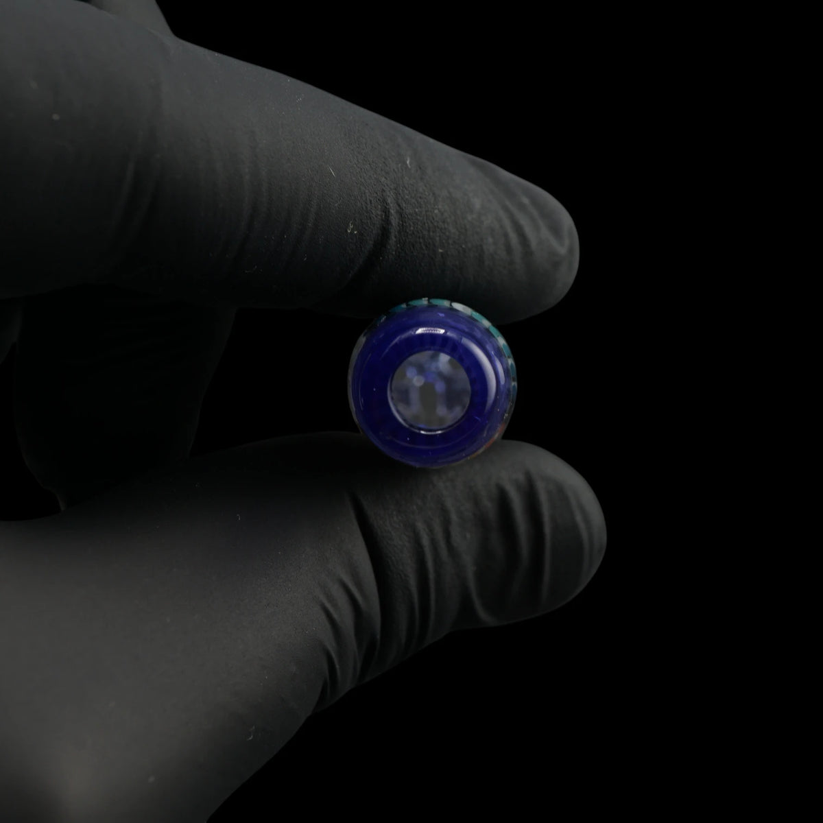 Close-up of the round mouthpiece opening on the Leisure Glass Blue Pulse glass tip with transparent blue glass