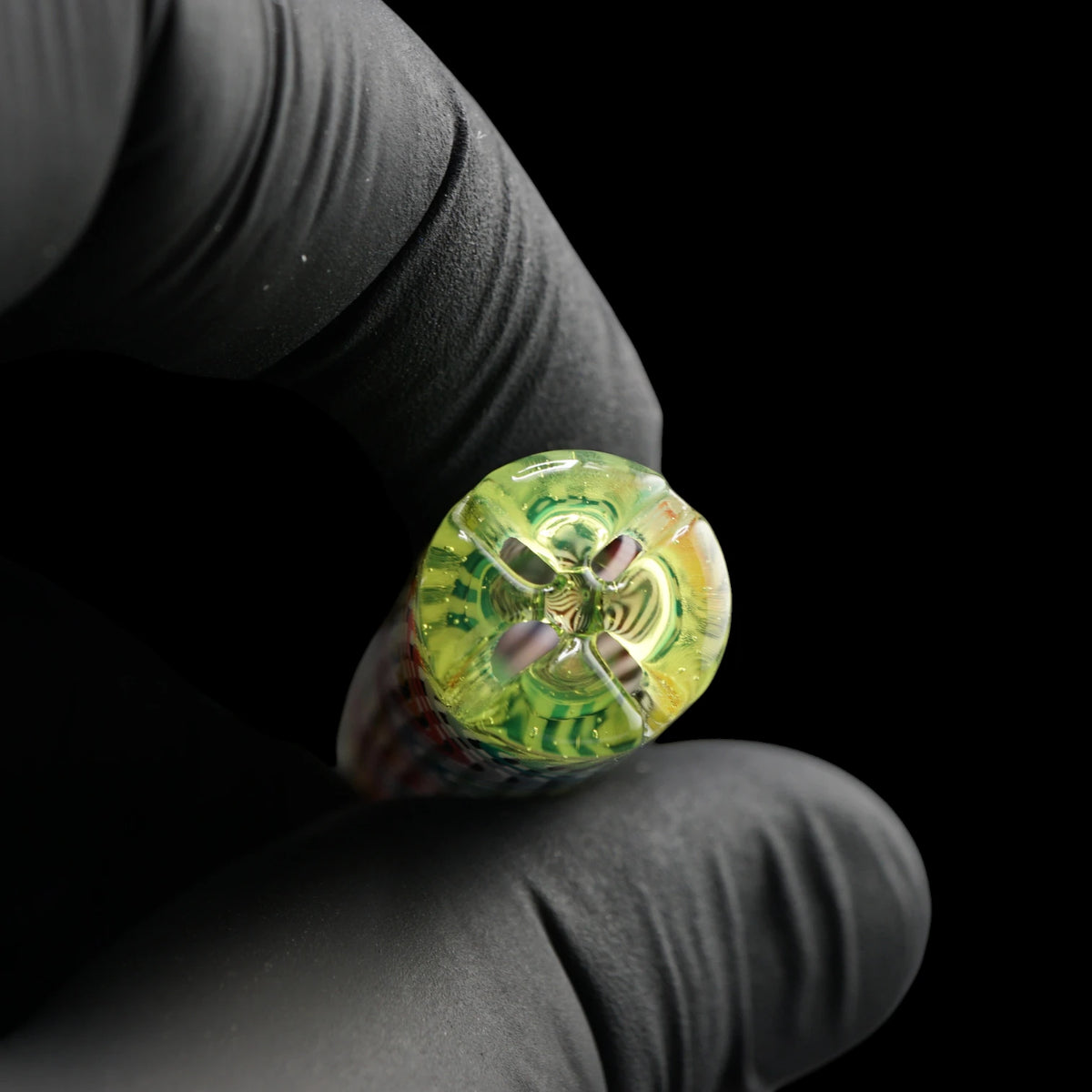 Close-up of the yellow-green filter end on the Leisure Glass Citrus Prism Hypnotech glass tip showing four openings