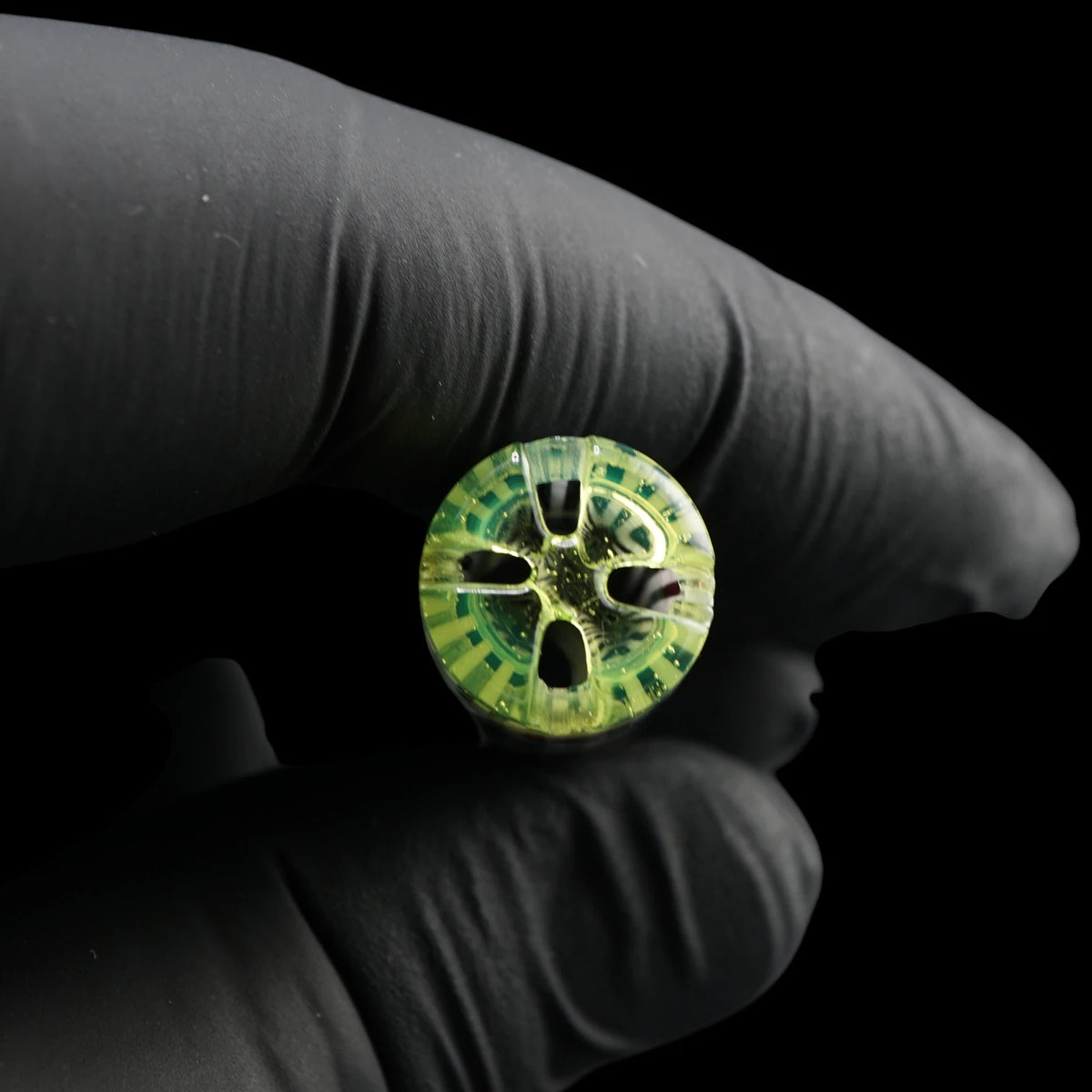 End view of the Leisure Glass Lime Echo Hypnotech glass tip showing four airflow openings around its central glass structure