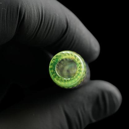 Close-up of the round mouthpiece opening on the Leisure Glass Lime Echo glass tip with transparent lime green glass