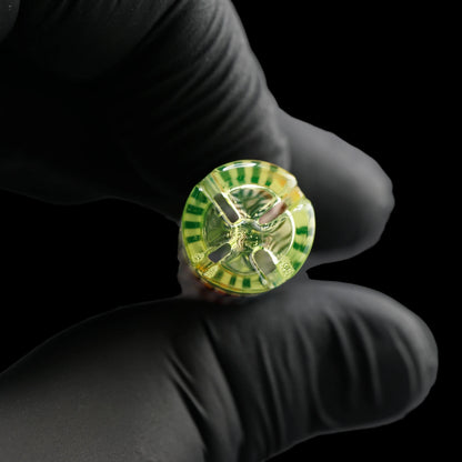 End view of the Leisure Glass Lime Reactor UV Hypnotech glass tip showing four airflow openings and its yellow-green glass filter structure