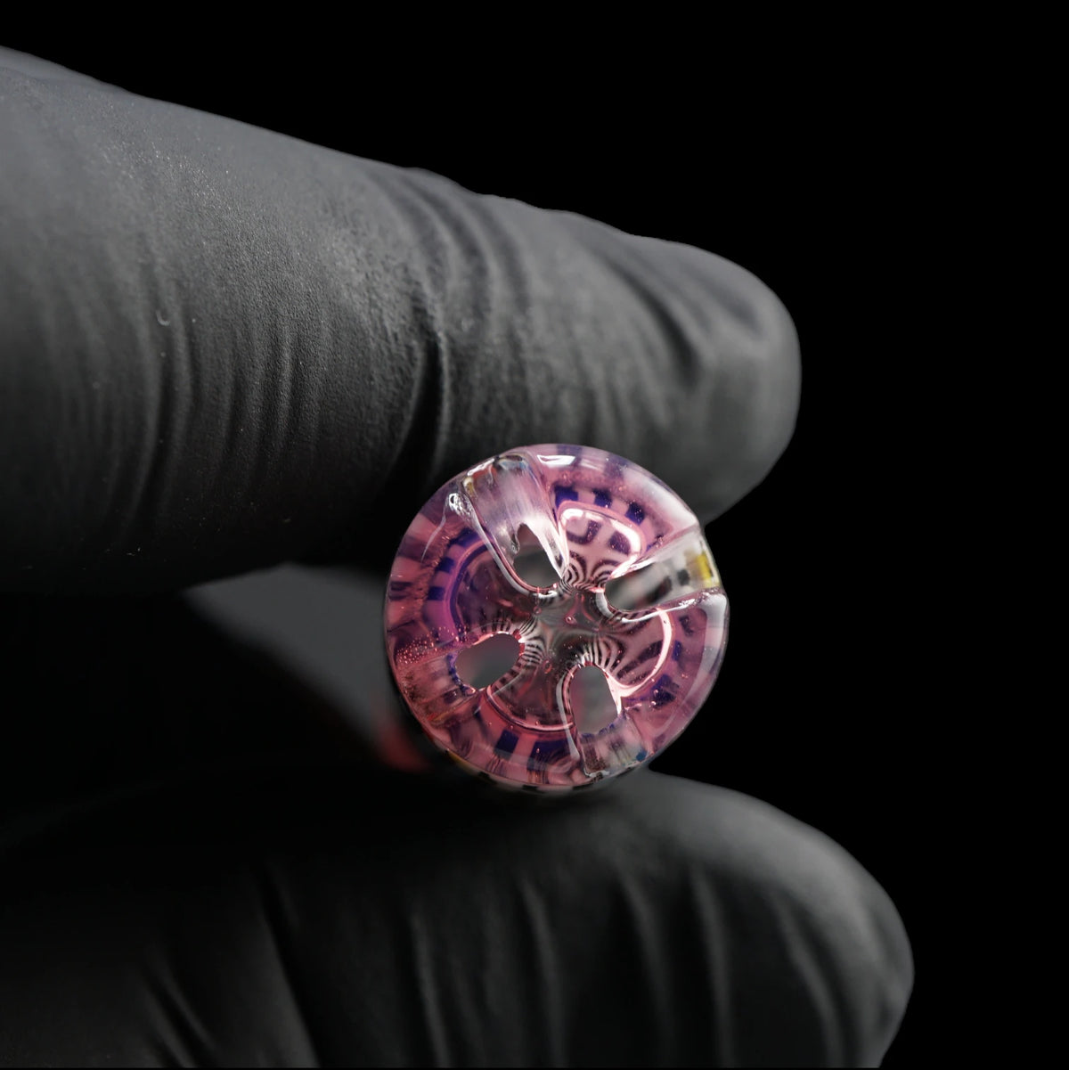 Close-up of the transparent pink filter end on the Leisure Glass Pink Reverie Hypnotech glass tip showing four openings