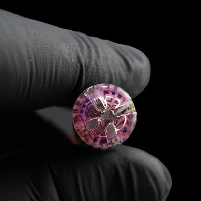 Close-up of the transparent pink filter end on the Leisure Glass Pink Reverie Hypnotech glass tip showing four openings