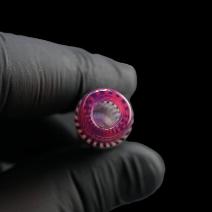 Close-up of the round mouthpiece opening on the Leisure Glass Pink Reverie Hypnotech glass tip with a pink rim and violet reflections