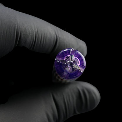 End view of the Leisure Glass Purple Haze Hypnotech glass tip showing four airflow openings and its purple glass filter structure