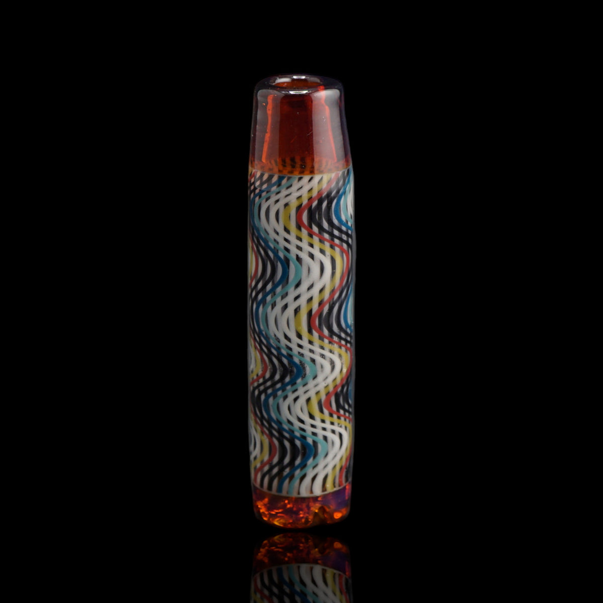 Leisure Glass Sienna Drift Hypnotech glass tip with transparent reddish-brown ends and black, white, blue, turquoise, red and yellow waves