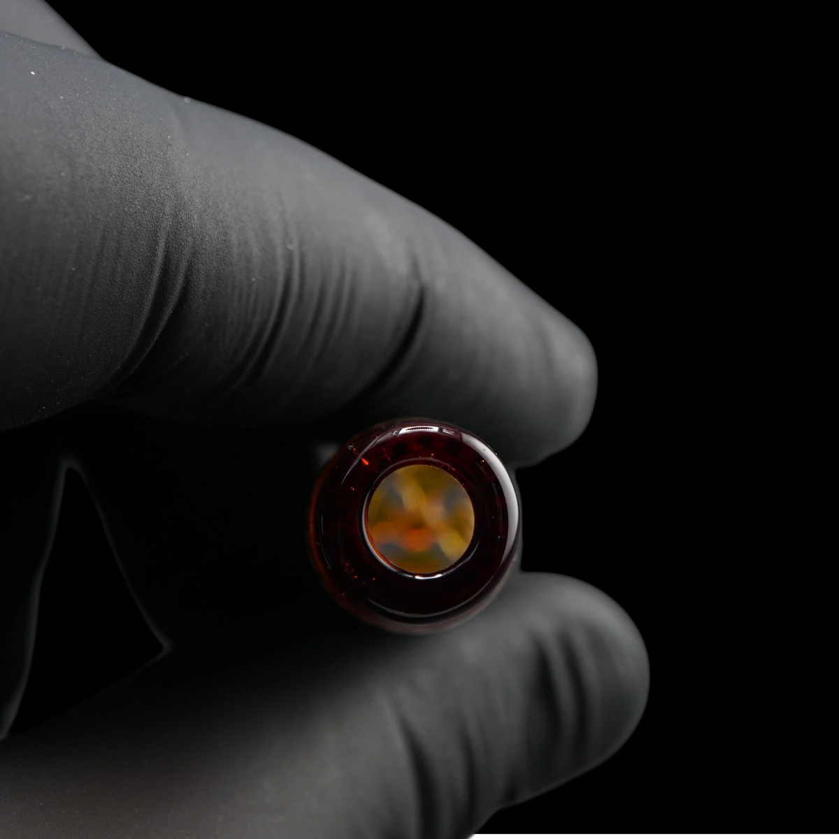 Close-up of the round mouthpiece opening on the Leisure Glass Sienna Drift Hypnotech glass tip with a transparent reddish-brown rim
