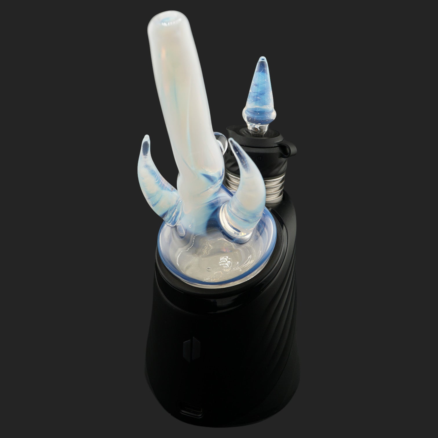 Side view of Twin Peaks Ghost with blue glass horns and milky translucent straw