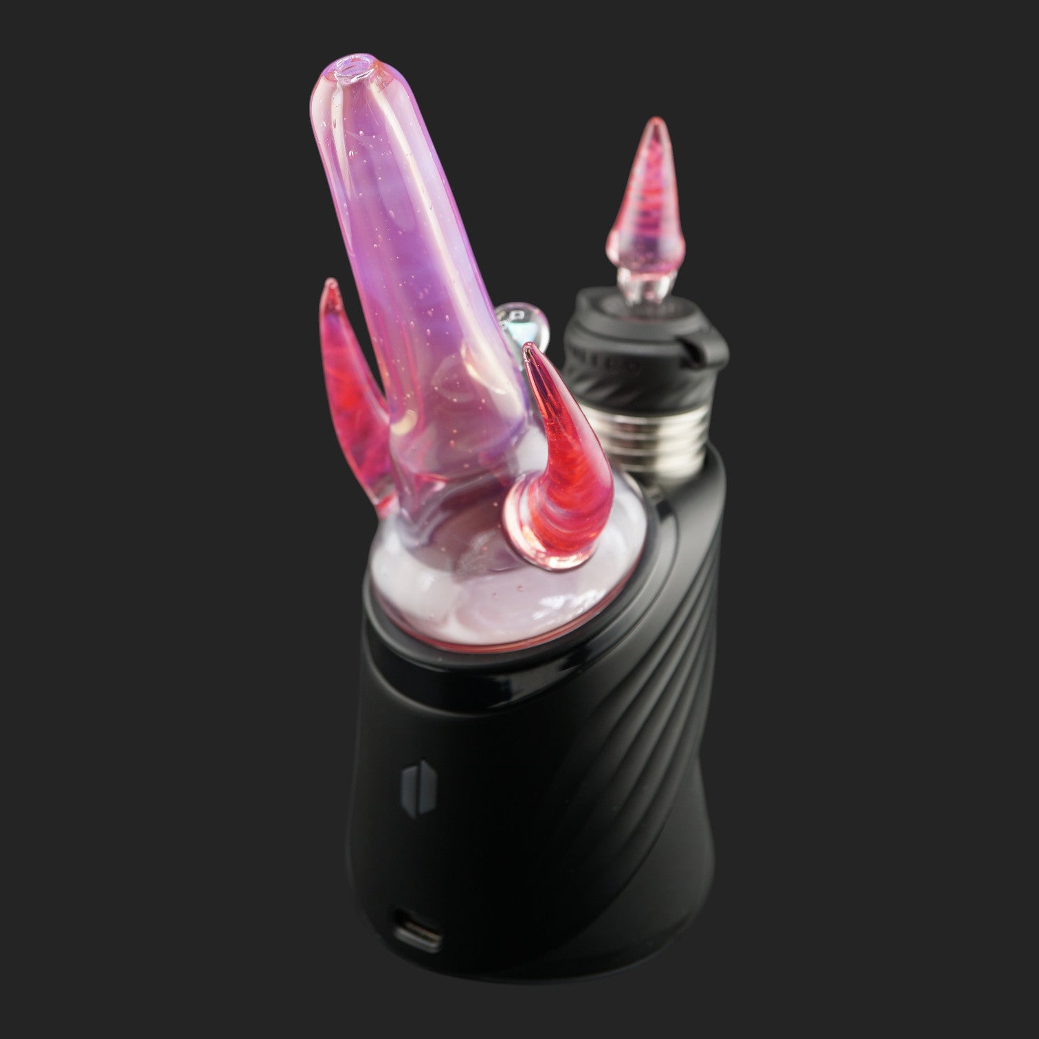 Side view of Twin Peaks Pink with curved glass horns and pink colored straw