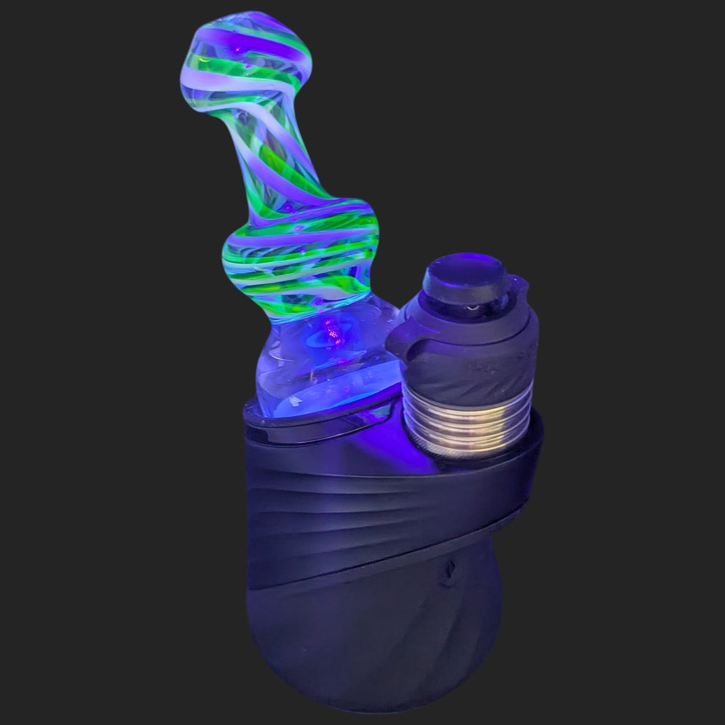 UV reactive Mind Blowing Glass Helix Dry Top glowing under ultraviolet light for Puffco Peak Pro