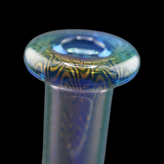 Close up Puffco dry top glass with flowing linework pattern blue green