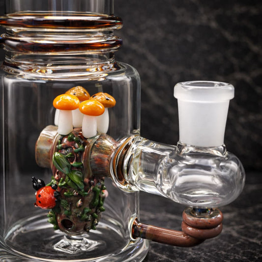 Side view of Renew the Redwood glass dab rig with fixed diffuser and 14.5mm joint
