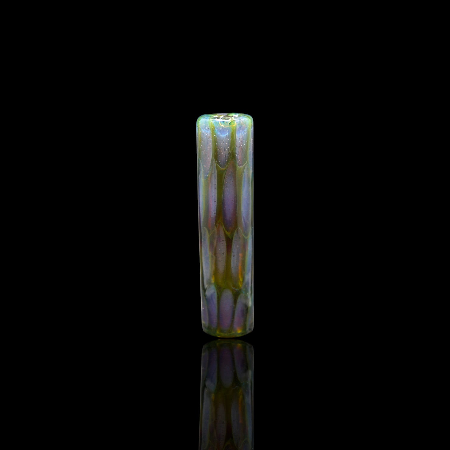 Handmade SteveHGlass borosilicate glass tip in 11 mm with iridescent purple, green and yellow design on black background.