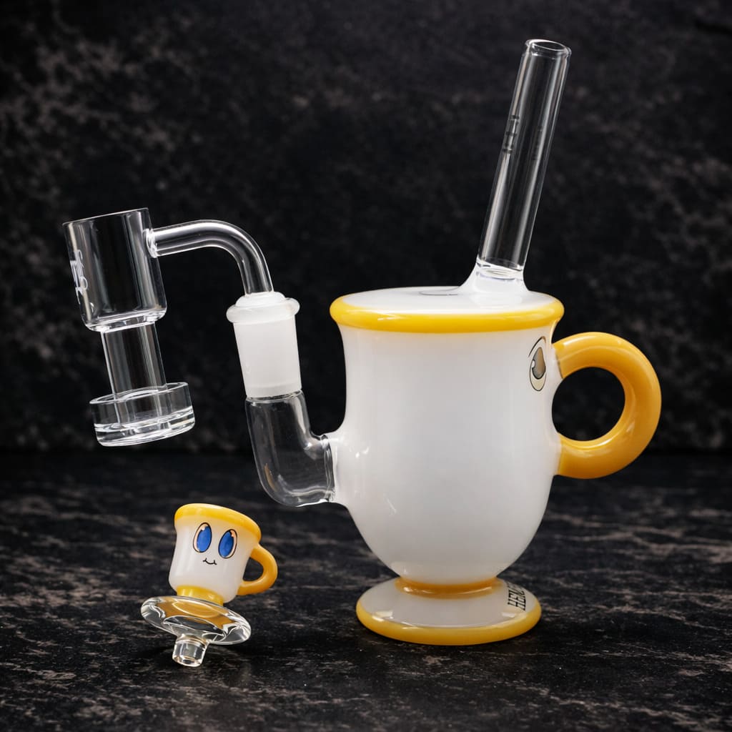Detail view of tea cup dab rig with showerhead percolator made of glass