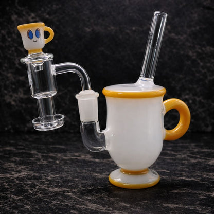 Tea cup dab rig with terp slurper, pillar and carb cap made of glass