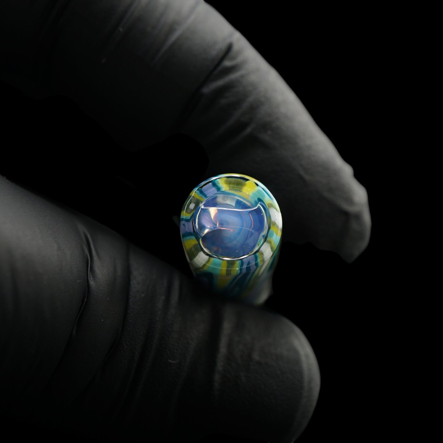 Close-up of the translucent blue Rotini filter inside the Tyeglassarts Arctic Stream glass tip