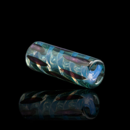 Transparent borosilicate glass tip by Tyeglassarts featuring deep ocean blue tones and floating dark glass inlays