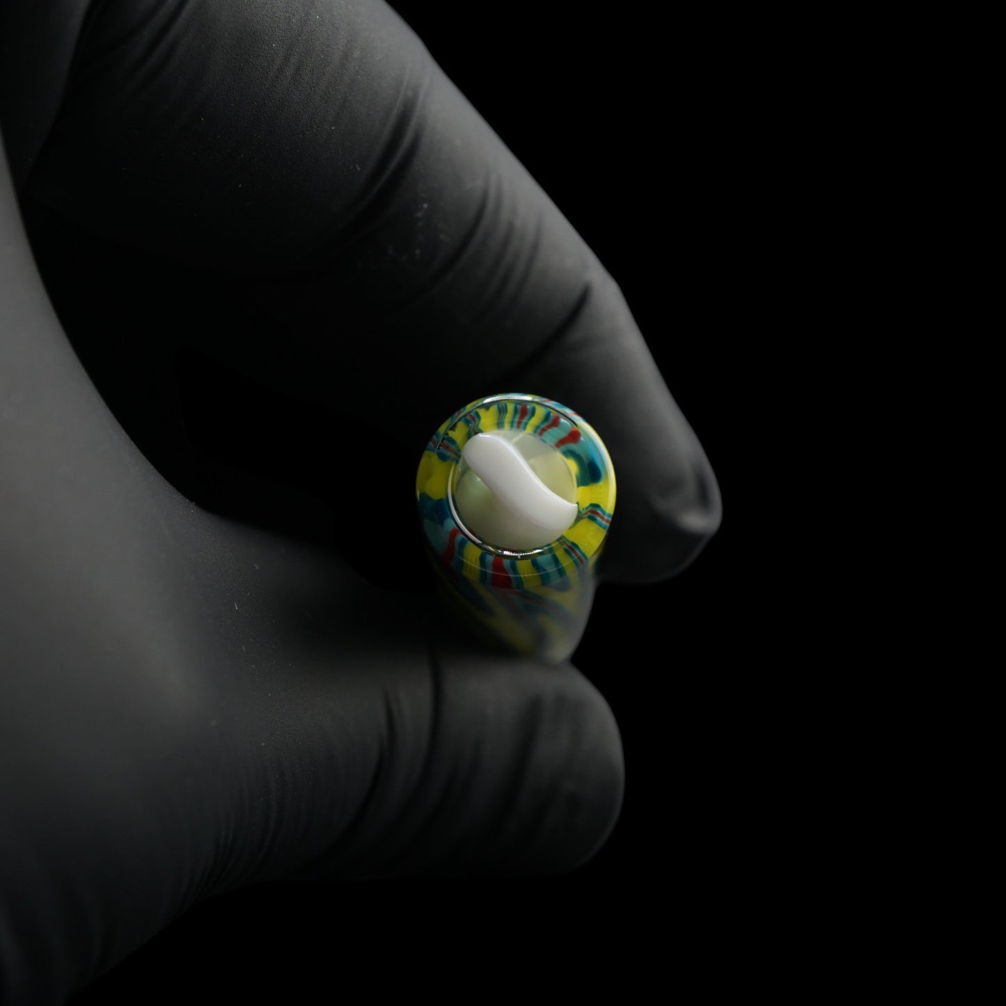 Close-up of the white spiral Rotini filter inside the Tyeglassarts Lime Vortex glass tip