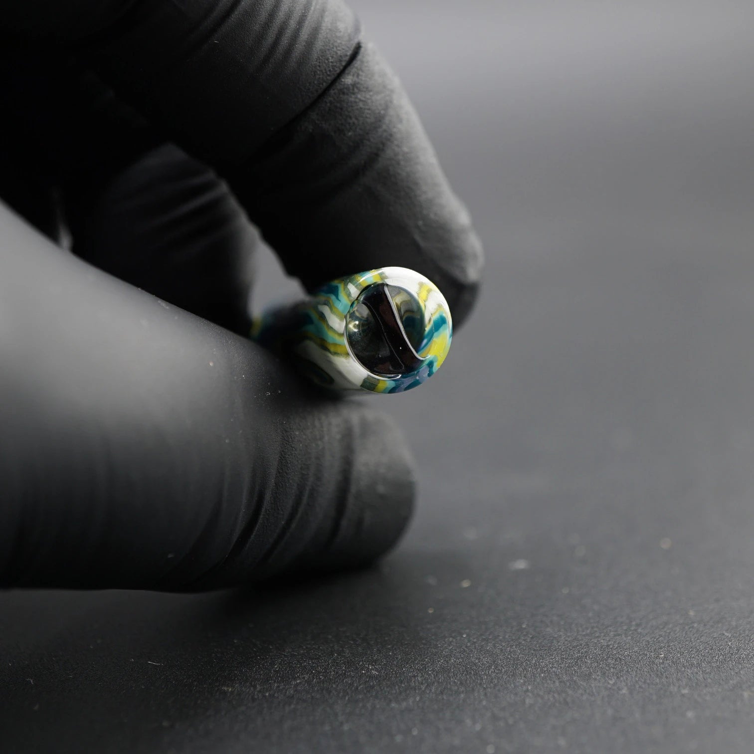 Close-up of the black spiral Rotini filter inside the Tyeglassarts Polar Lagoon glass tip