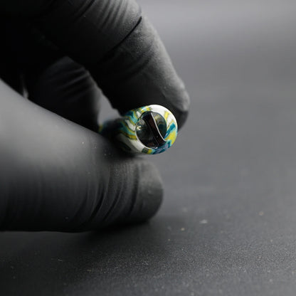 Close-up of the black spiral Rotini filter inside the Tyeglassarts Polar Lagoon glass tip