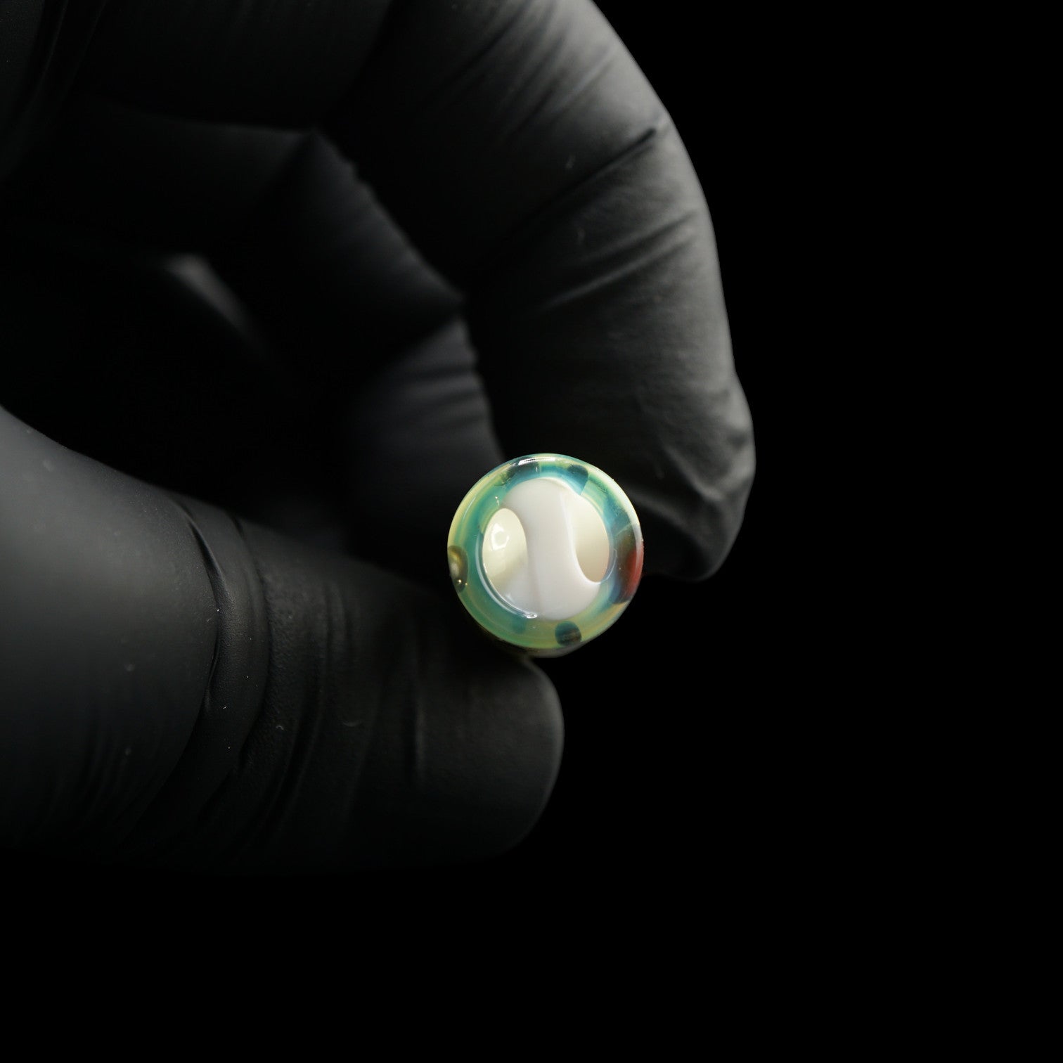 Close-up of the spiral Rotini glass filter inside the handmade Tyeglassarts Relic joint tip